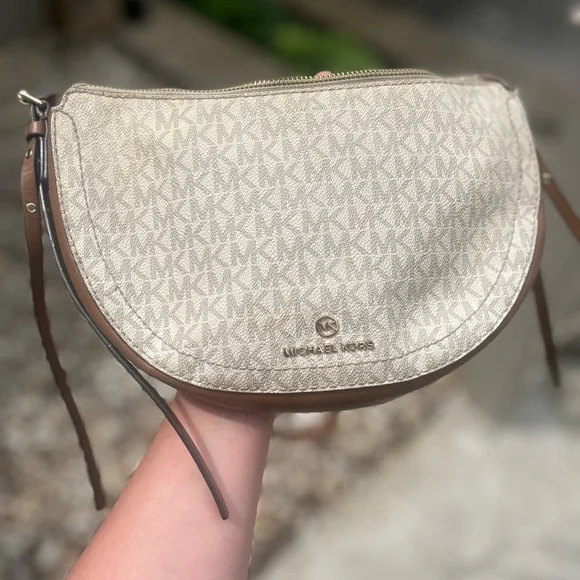 Shop Michael Kors Outlet Bags in 2026 Michael Kors Cream and Brown Shoulder Bag with Monogram Print main image 1